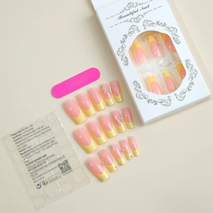Full set of yellow French tip press-on nails with butterfly charms and application kit