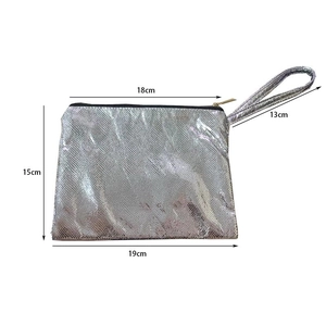 Detailed view of silver snakeskin texture makeup bag with size dimensions 19x15cm