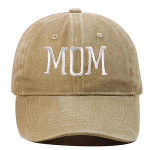 Close-up of white 'MOM' embroidery on khaki washed cotton vintage baseball cap