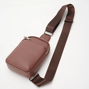Men's dark brown cross-body chest bag with lychee grain leather and adjustable strap