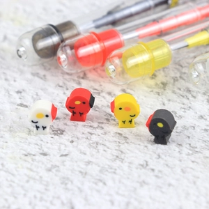 Macro view of luminous fishing float accessories with colorful cartoon bird space beans
