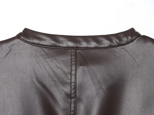 Detailed close-up of dark brown PU leather dress neckline showing stitching and texture