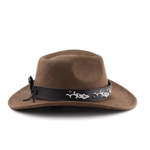 Close-up of brown suede cowboy hat with vine embroidery and metallic studs on the band