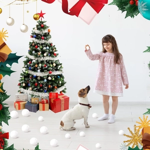 Detailed view of artificial snowballs under a decorated Christmas tree with gift boxes