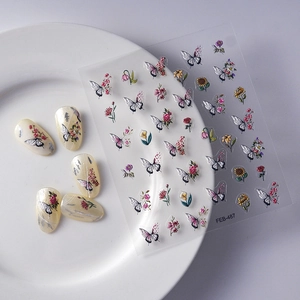 Colorful 3D butterfly nail stickers for DIY manicure with vibrant floral patterns