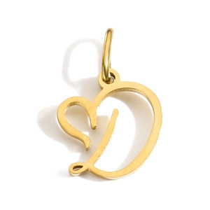 Macro shot of gold heart-shaped pendant featuring letter D design on white backdrop