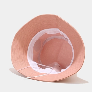 Peachy pink cotton bucket hat with shell label and adjustable inner drawstring for women
