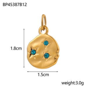 Golden round hammered pendant with blue crystals and star engraving, 1.8cm height
