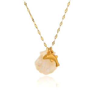 Detailed macro view of 18K gold starfish necklace with iridescent shell and dolphin charms