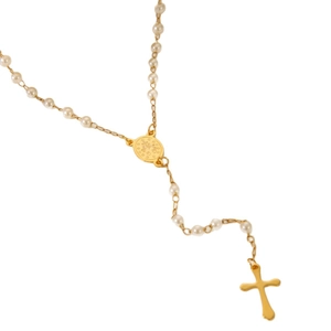 Cross necklace with faux pearls and golden religious medal charm on a plain white background