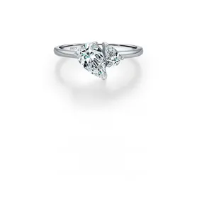 Detail of S925 sterling silver open ring featuring pear-cut stones in a crossover design