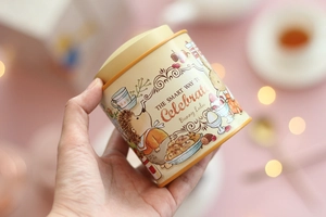 Detailed macro view of a vintage Bunny Lulu tin can featuring classic animal illustrations