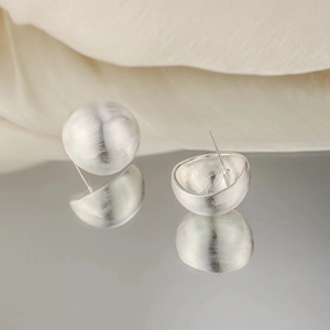 Minimalist matte silver brushed stud earrings for women with mirror reflection effect