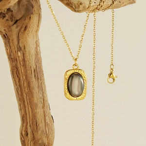 Retro 18K gold-plated stainless steel necklace with gray stone pendant on a branch