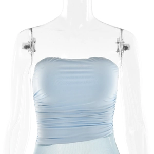Detailed view of light blue tube top with pleated chest design on transparent mannequin