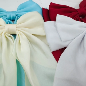 Large satin bow hair clips in multiple colors with elegant vintage long ribbon streamers