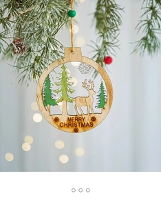 Close-up of wooden Christmas tree ornament with reindeer, laser-cut design and beads