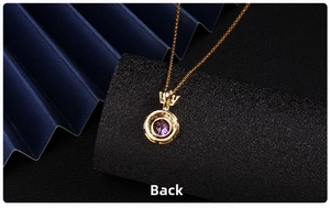 Macro shot showing the back side details and golden metal structure of the purple necklace