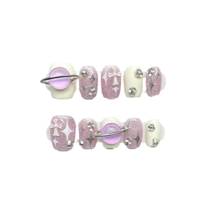Faux ongles faits main rose pailleté avec planètes violettes et croix argentées, 10 pcs