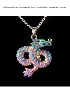 Macro shot of 3D dragon pendant with colorful iridescent plating on a silver box chain
