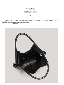 Top view of large black leather tote bag interior showing spacious main compartment
