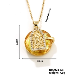 Detailed size specifications for gold portrait pendant necklace with yellow crystals