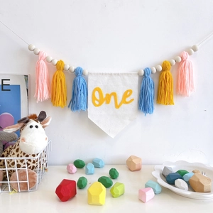 Boho first birthday high chair banner with fabric tassels and One embroidered flag
