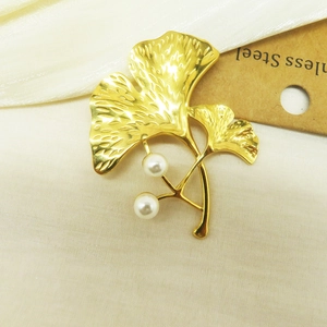 Elegant 18k gold plated stainless steel ginkgo leaf brooch with white pearls on silk