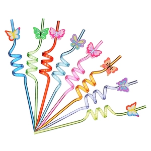 Close-up of colorful PVC butterfly ornaments on spiral straws for party favors