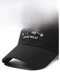 Detailed view of the black baseball cap with 3D embossed Stockholm lettering and visor stitching