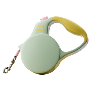 Automatic retractable mint green dog leash with ergonomic handle and bone pattern