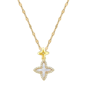 Golden clover pendant necklace with zircon paving and mother of pearl on a fine chain
