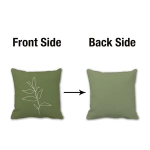 Modern green throw pillow with white minimalist leaf pattern and dual-tone fabric design