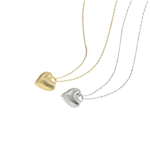 Vintage gold and silver heart necklaces with striped texture on minimalist chains