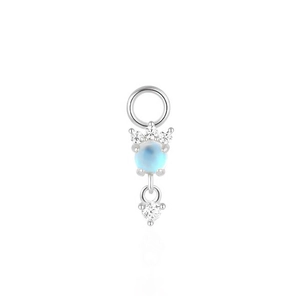 Macro shot of S925 silver charm with moonstone and cubic zirconia for earrings