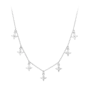 Detailed macro view of S925 silver necklace with seven zircon encrusted cross charms