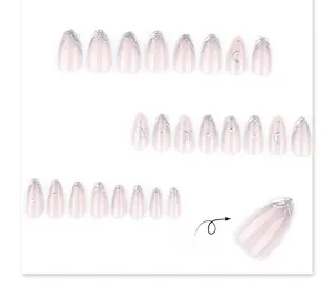 Detailed set of 24 nude pink press-on nails with silver 3D stars and moon patterns