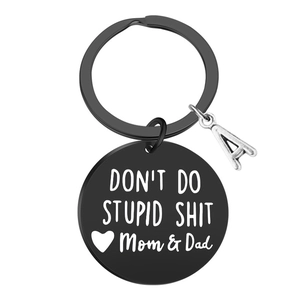 Black round keychain engraved with Don't Do Stupid message and silver letter A charm