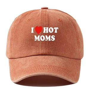 Close-up of I Heart Hot Moms embroidery on vintage washed red cotton baseball cap