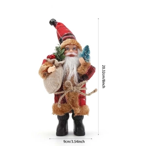 Detail of 8-inch Santa plush figure with red plaid outfit and mini flocked tree