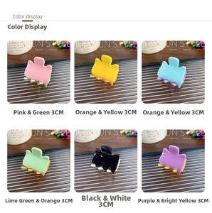 Detail view of 3CM candy-colored acrylic hair claws in six dual-tone color combinations