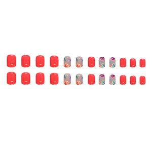 Short round press-on nails set with red and floral patterns in 24 piece variety pack