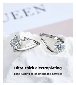 Macro shot of S925 silver irregular stud earrings with round moissanite on stone
