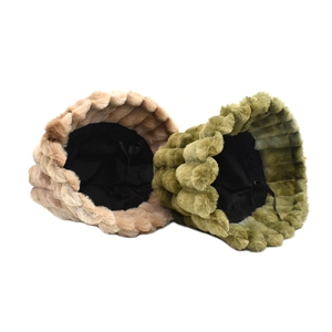 Detail view of rainbow plush bucket hats featuring bubble texture and adjustable inner drawstring