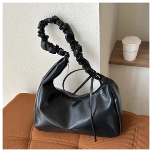 Black faux leather slouchy shoulder bag with unique pleated scrunchie strap for women stylish