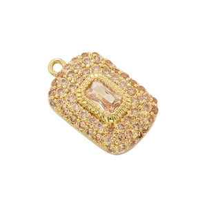Luxury gold rectangular pendant with champagne crystal pavé setting on white background