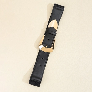 Women's black elastic waist belt featuring a polished gold horseshoe buckle and faux leather