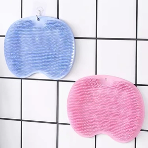 Silicone wall-mounted bath and foot massage mats in light blue and pink colors