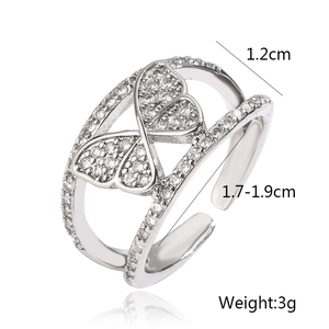 Macro detail of silver butterfly ring with dimensions 1.2cm width and 3g weight