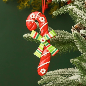 Christmas candy cane hanging ornament with red green bow and white floral details